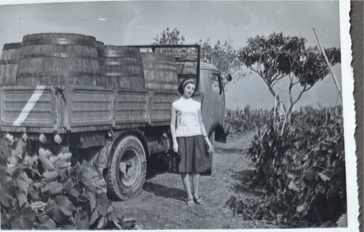 Family archive photograph beside the barrel lorry